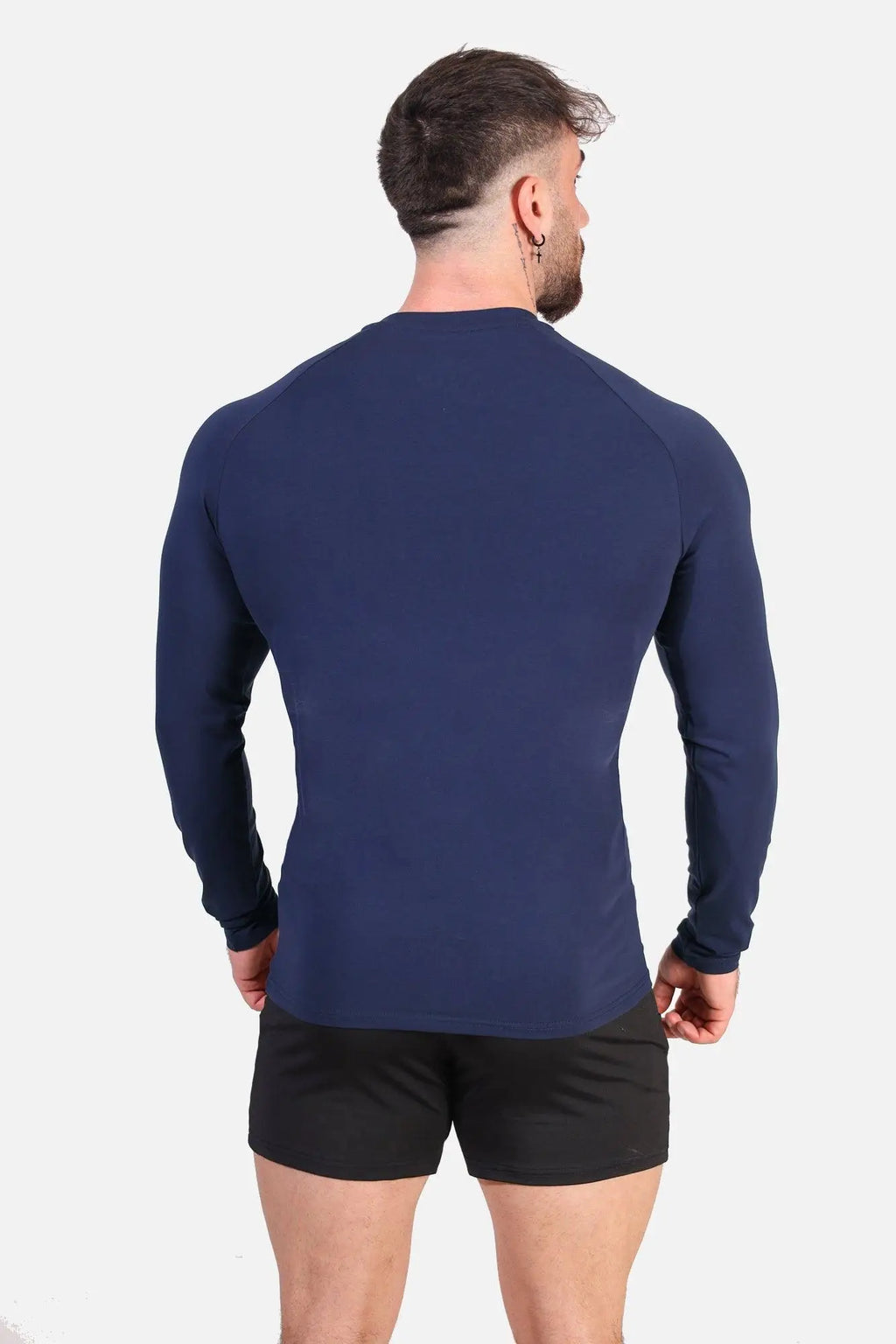 Navy titan muscle-fit long sleeve athletic shirt made from breathable fabric for active performance