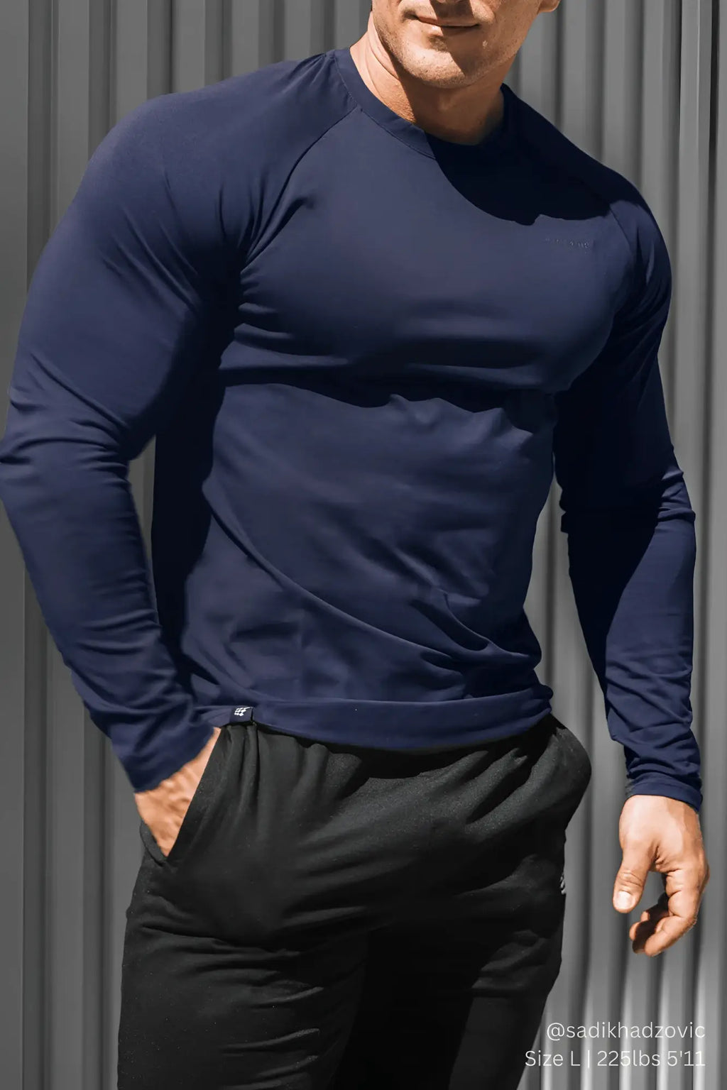 Navy blue Titan muscle-fit long sleeve athletic shirt with raglan sleeves and crew neck for active wear