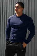 Navy titan muscle-fit long sleeve athletic shirt made from breathable fabric for enhanced performance and comfort