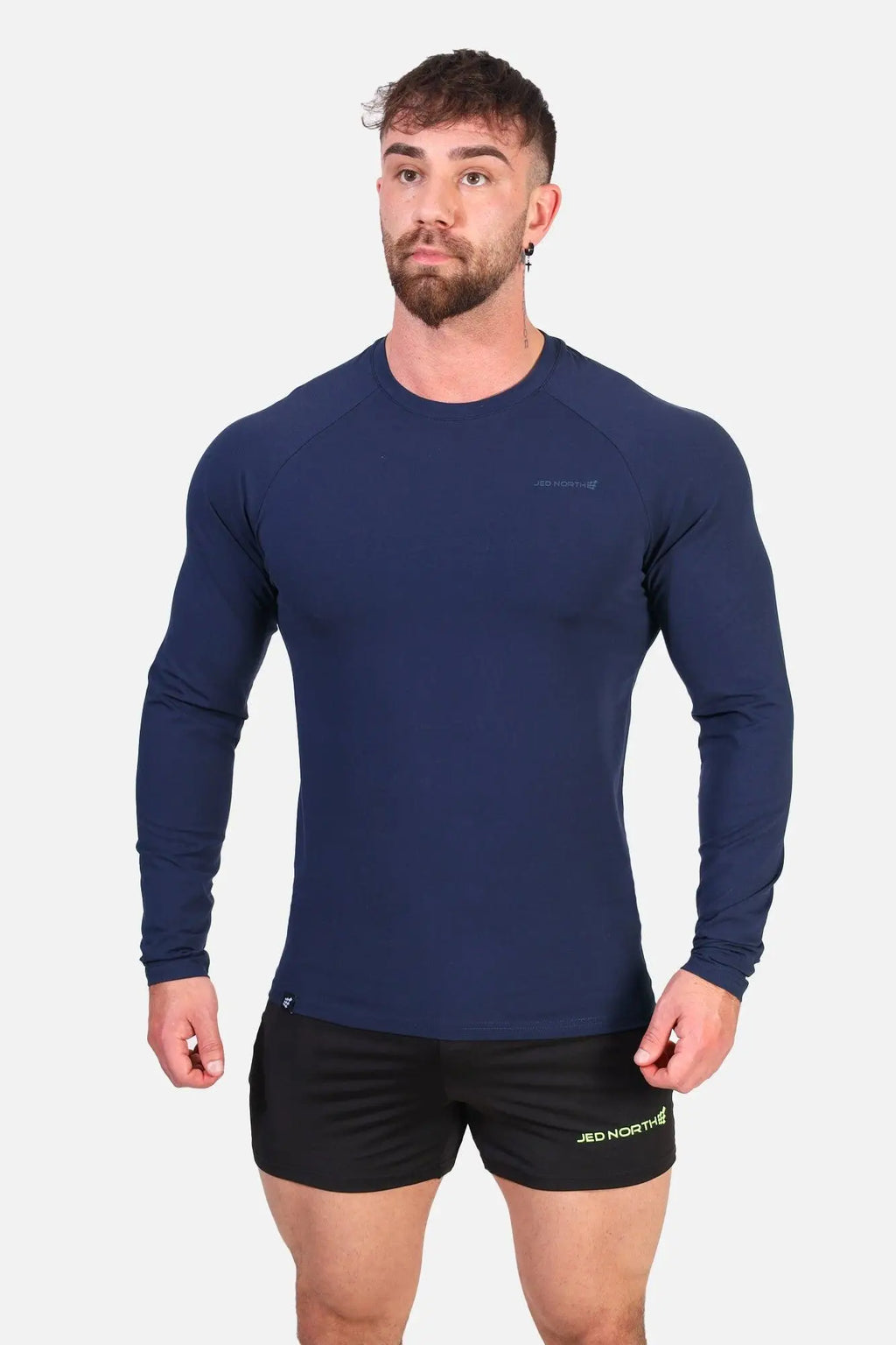 Navy blue Titan muscle-fit long sleeve compression shirt designed for athletic performance and muscle support