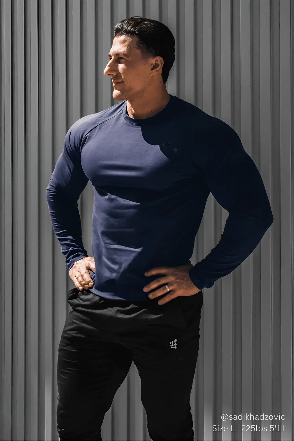 Navy titan muscle-fit long sleeve t-shirt made of fitted athletic fabric for enhanced performance and comfort