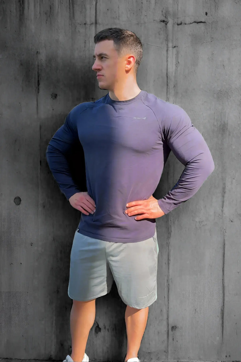Titan muscle-fit long sleeve t-shirt in navy to purple gradient made from stretchy performance fabric