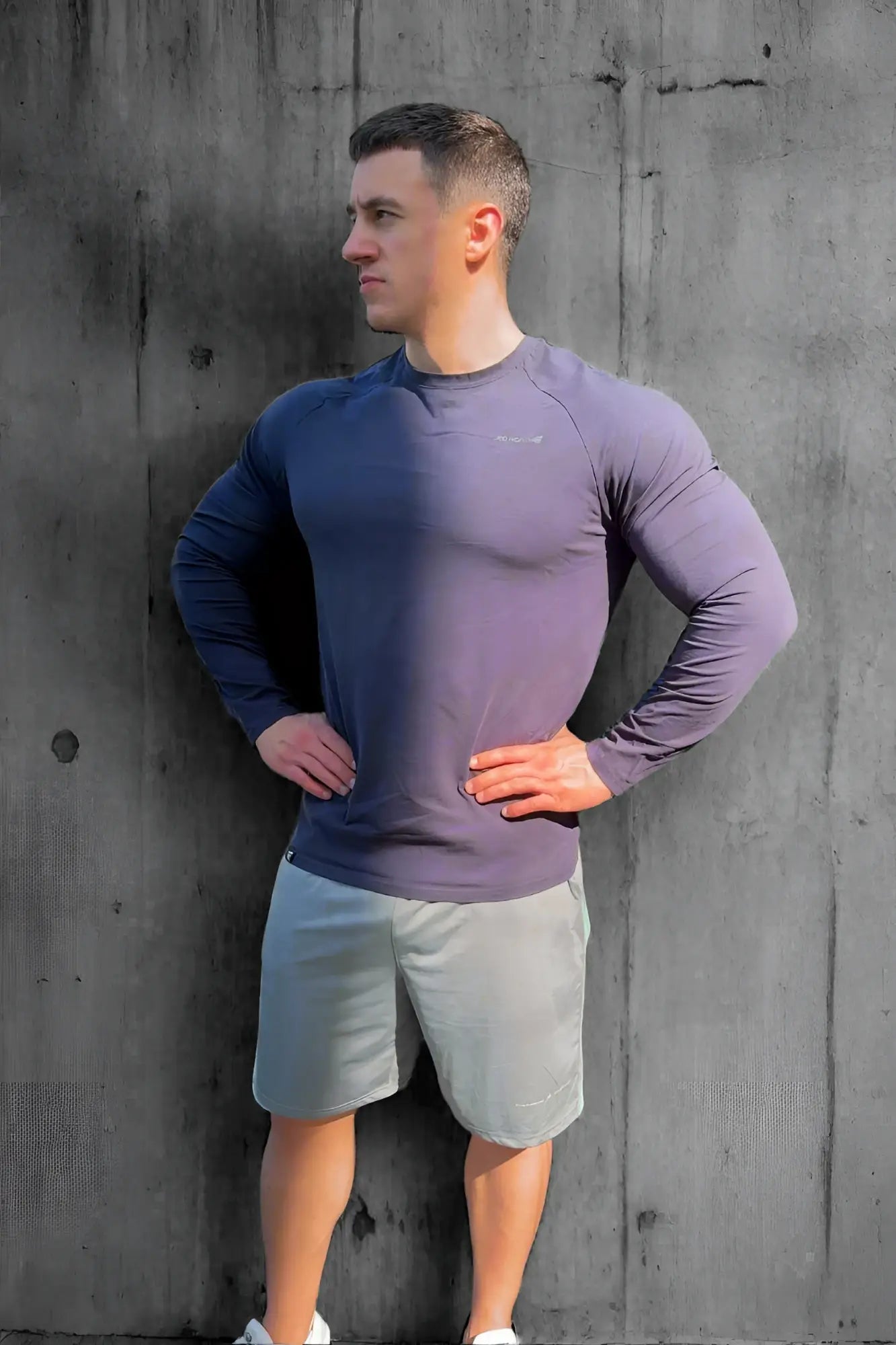 Titan muscle-fit long sleeve t-shirt in navy to purple gradient made from stretchy performance fabric