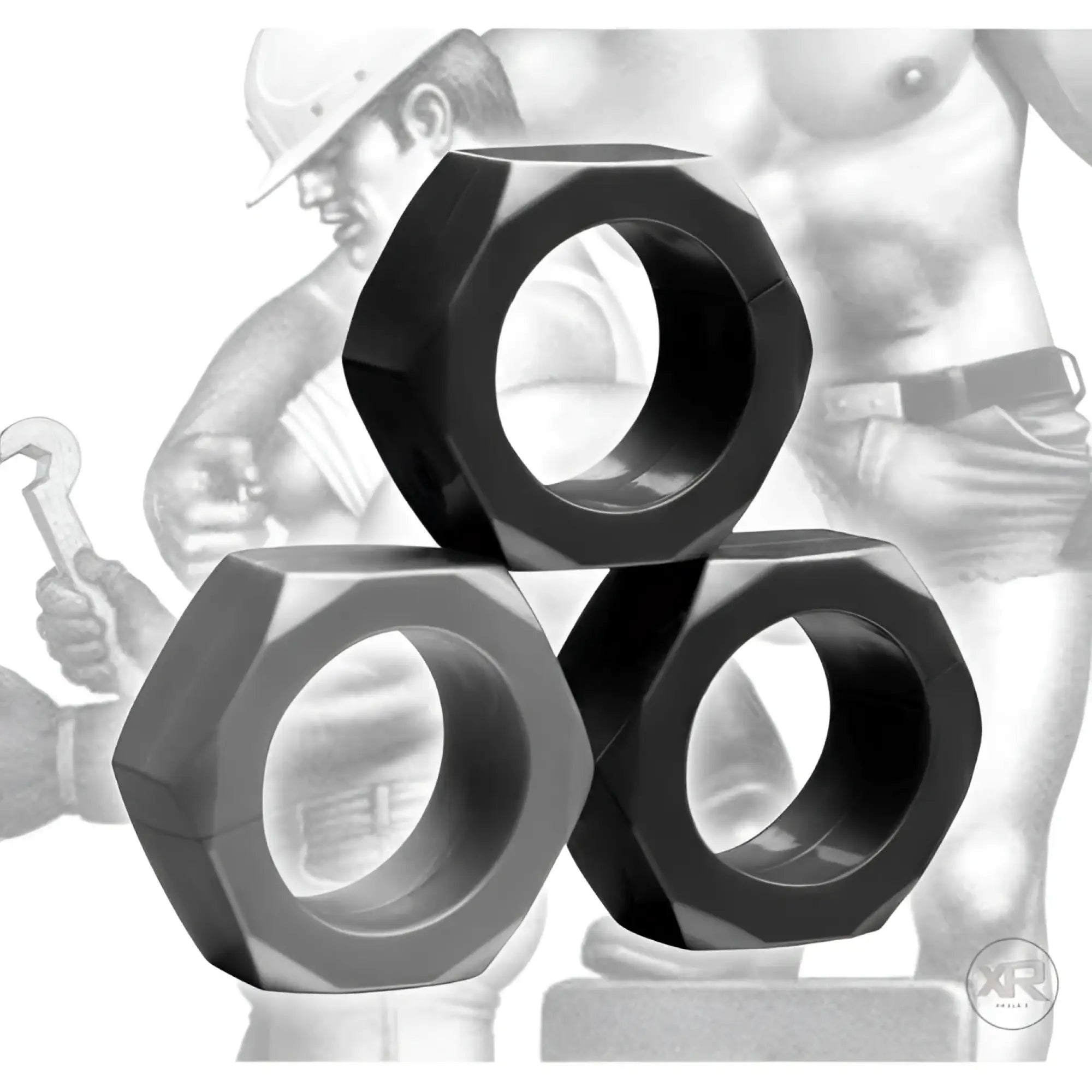 Tom of Finland 3-piece set of black, hexagonal, metal-style cock rings displayed against a classic character illustration.
