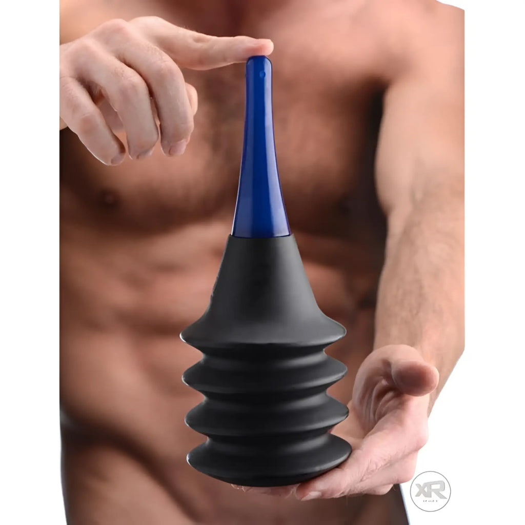 Black and blue tom of finland enema delivery system with ribbed silicone body and rigid plastic nozzle
