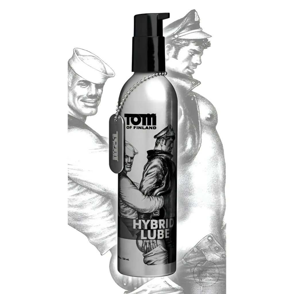 Tom of Finland Hybrid Lube in a silver pump bottle with a dog tag, featuring black-and-white illustrated artwork.