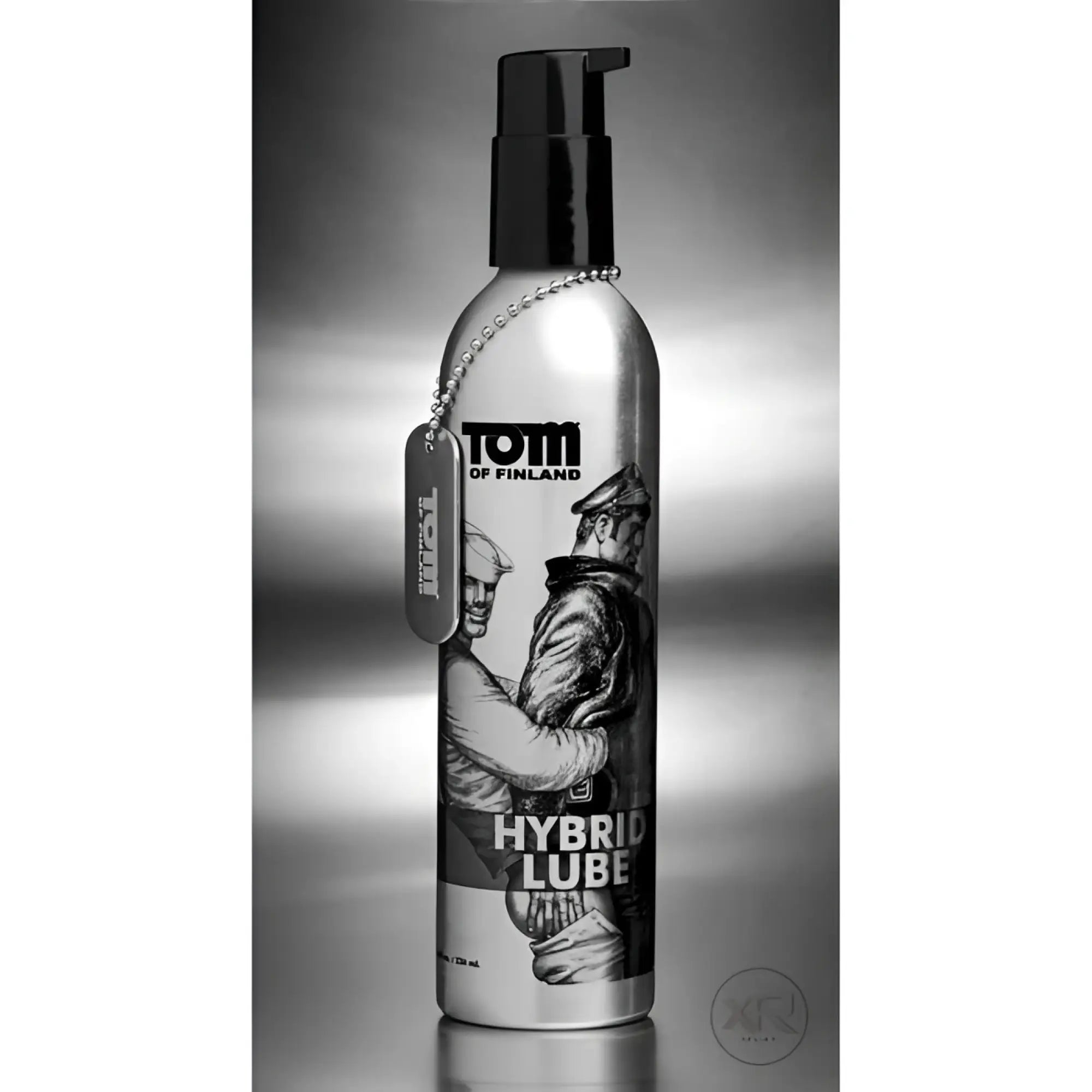 Tom of Finland Hybrid Lube in a silver pump bottle with black art and an attached metal dog tag.