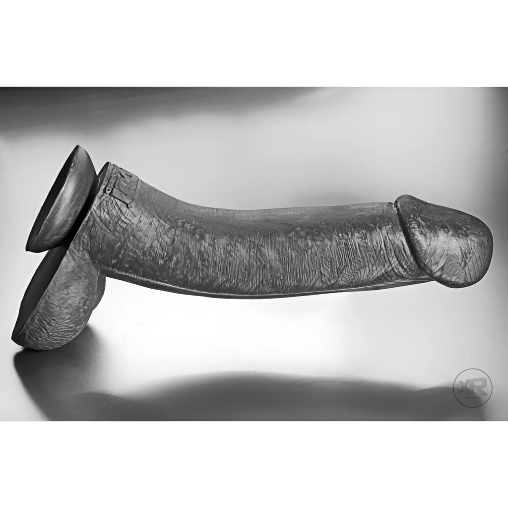 Tom of Finland Kake Cock: A 12-inch, black, realistic silicone dildo with a textured shaft and suction cup base.