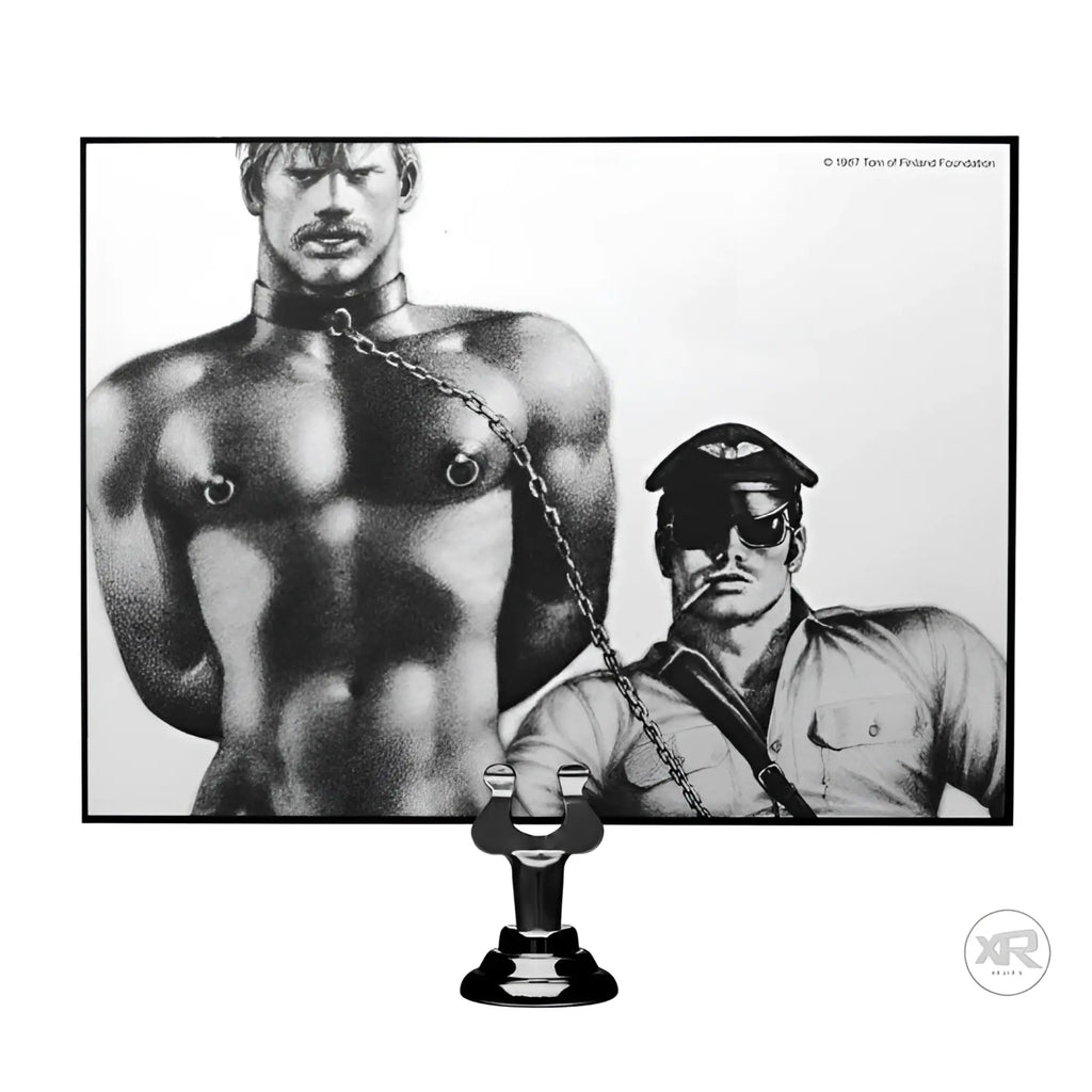 Tom of Finland neoprene collar with a sleek black finish, shown below a classic erotic illustration by Tom of Finland.
