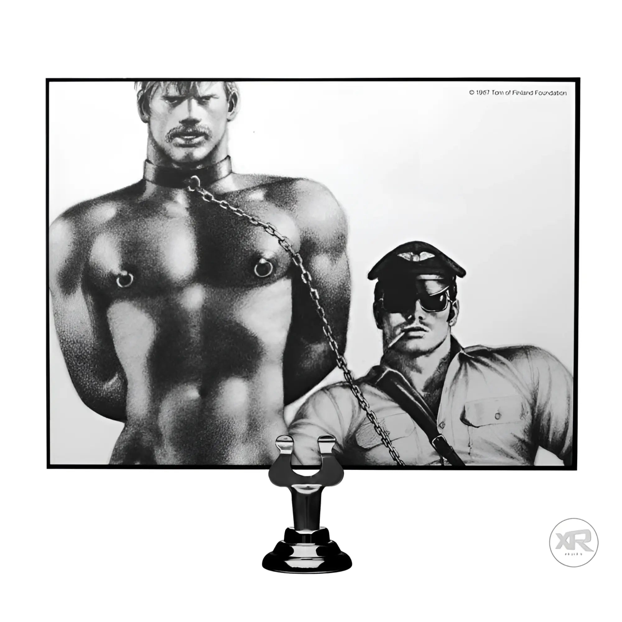 Tom of Finland neoprene collar with a sleek black finish, shown below a classic erotic illustration by Tom of Finland.