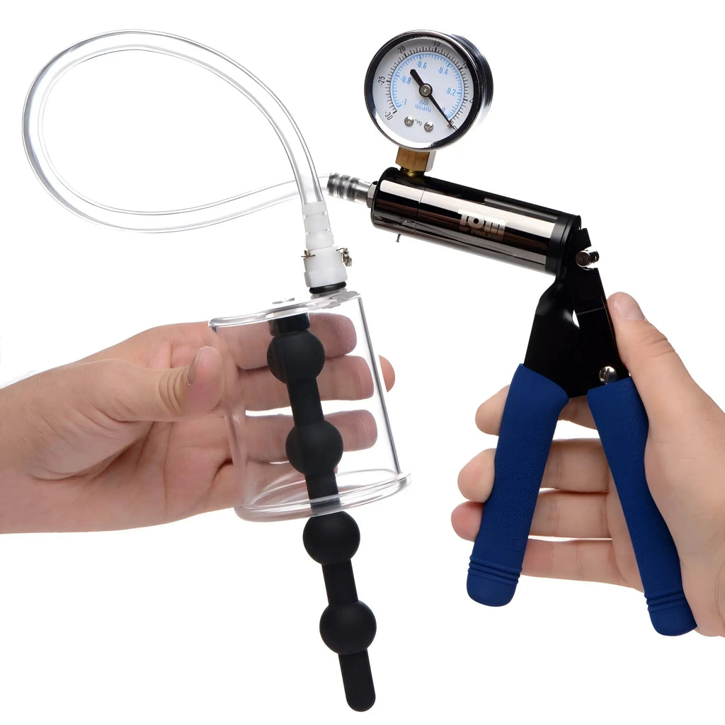 Tom of Finland Rosebud Cylinder with black beaded silicone insert, clear tube, and blue-handled vacuum pressure gauge.