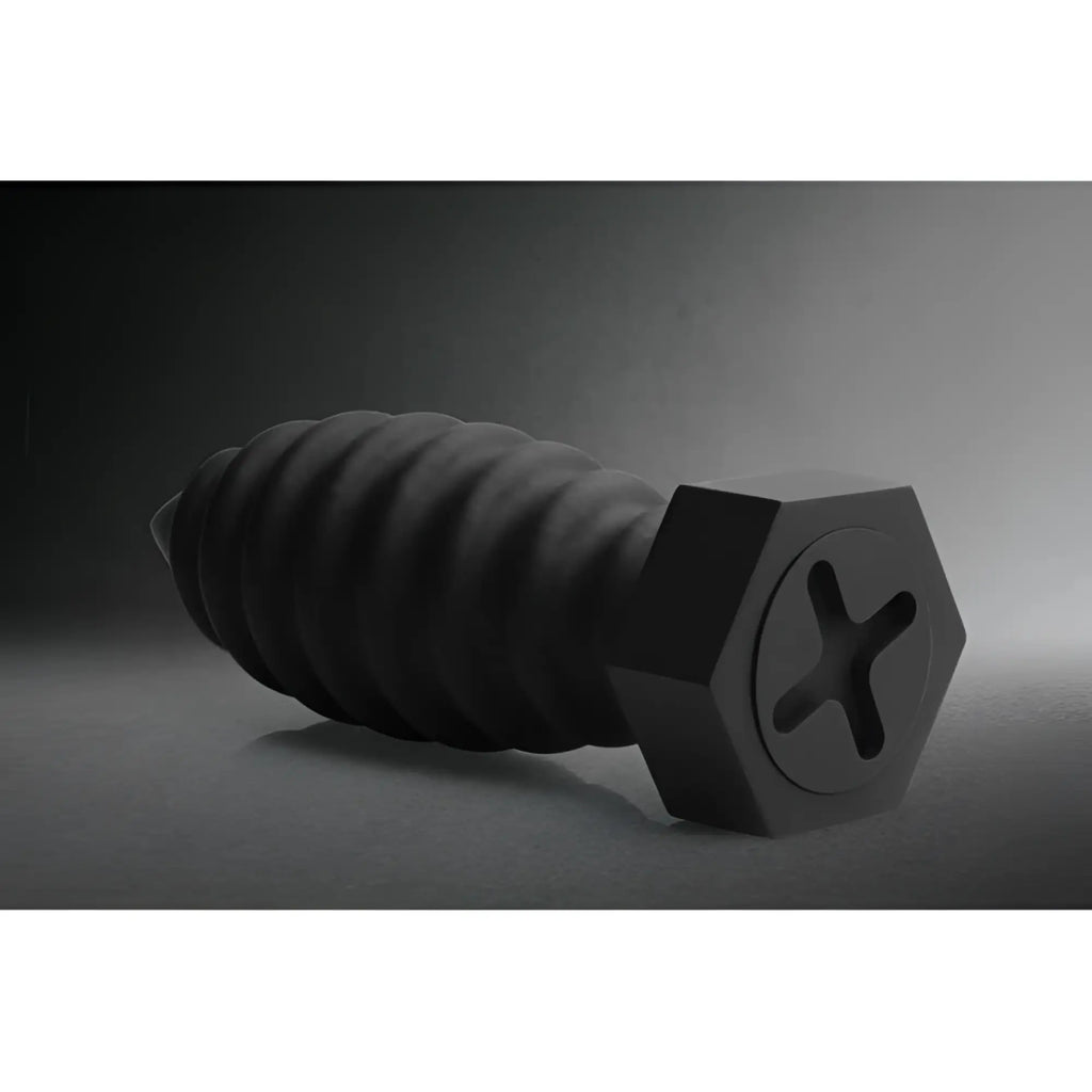 Matte black Tom of Finland Screw U anal plug shaped like a large metal screw with a hexagonal head and ribbed base.