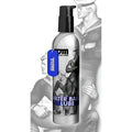 Silver metallic bottle of tom of finland water based lube with black pump and vintage sailor label and blue tag