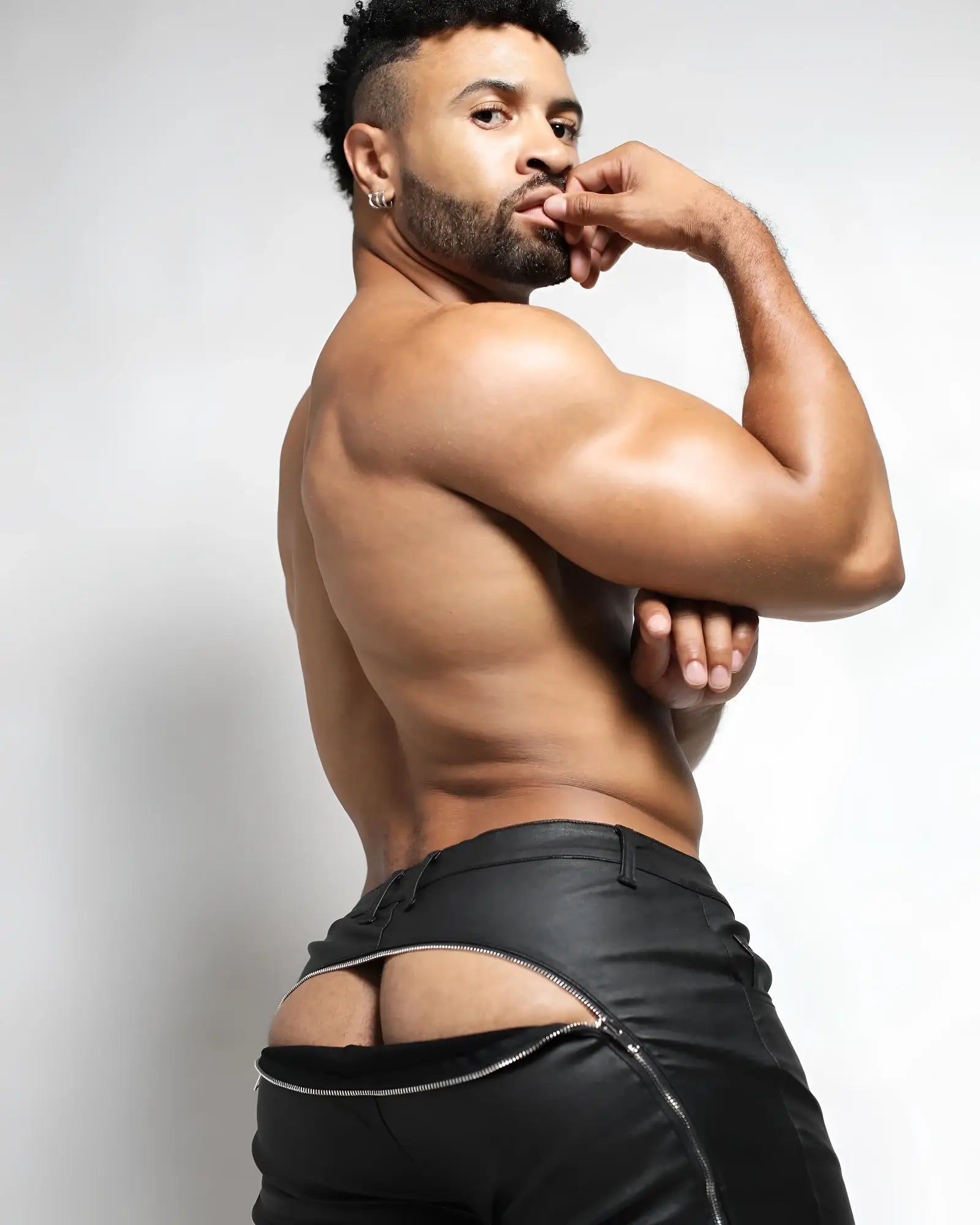 Black leather toro zipper pant shown from the back with distinctive zipper detail at the rear waistband