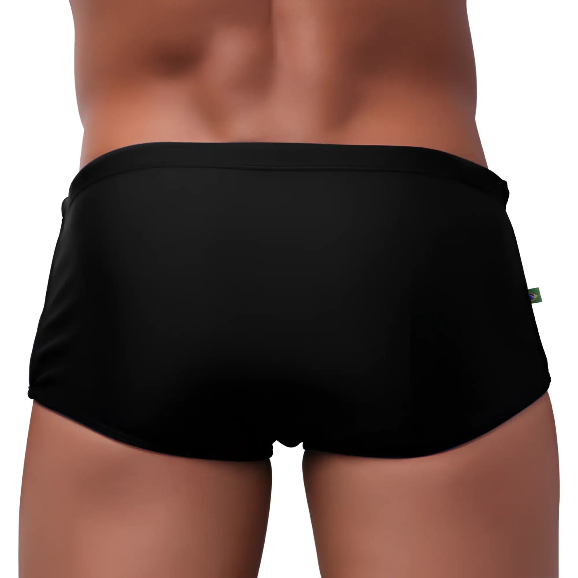 Black traditional square solids cut sunga male bathing suit with smooth form-fitting fabric and small green side tag