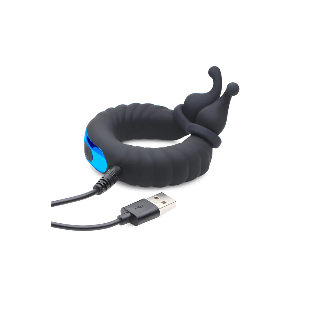 Trinity Men 10X Cobra silicone cock ring in matte black, featuring dual probes, blue accents, and a USB charging cable.