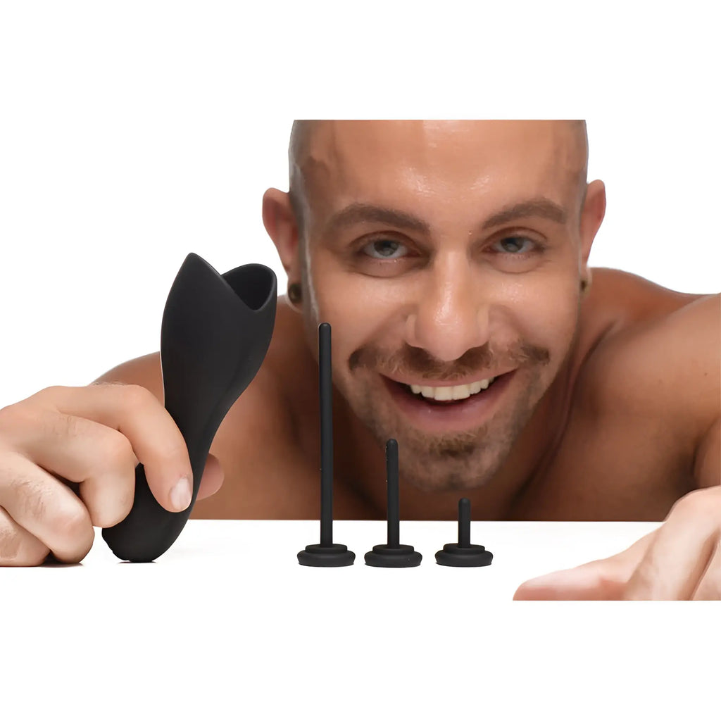 Trinity Men 10X vibrating penis head teaser in matte black with three included urethral sounds of varying lengths.