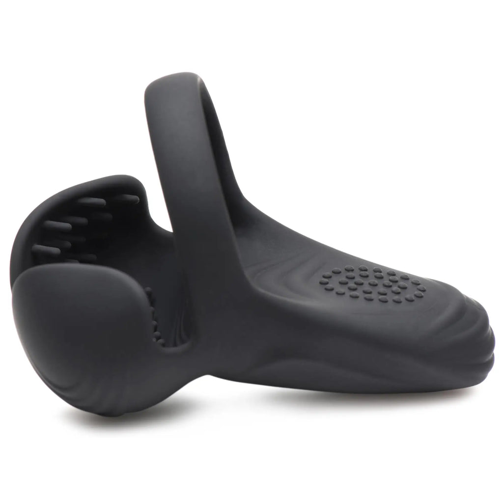 Trinity Men 10X vibrating silicone cock ring in matte black with a textured, contoured design and perineum stimulator.