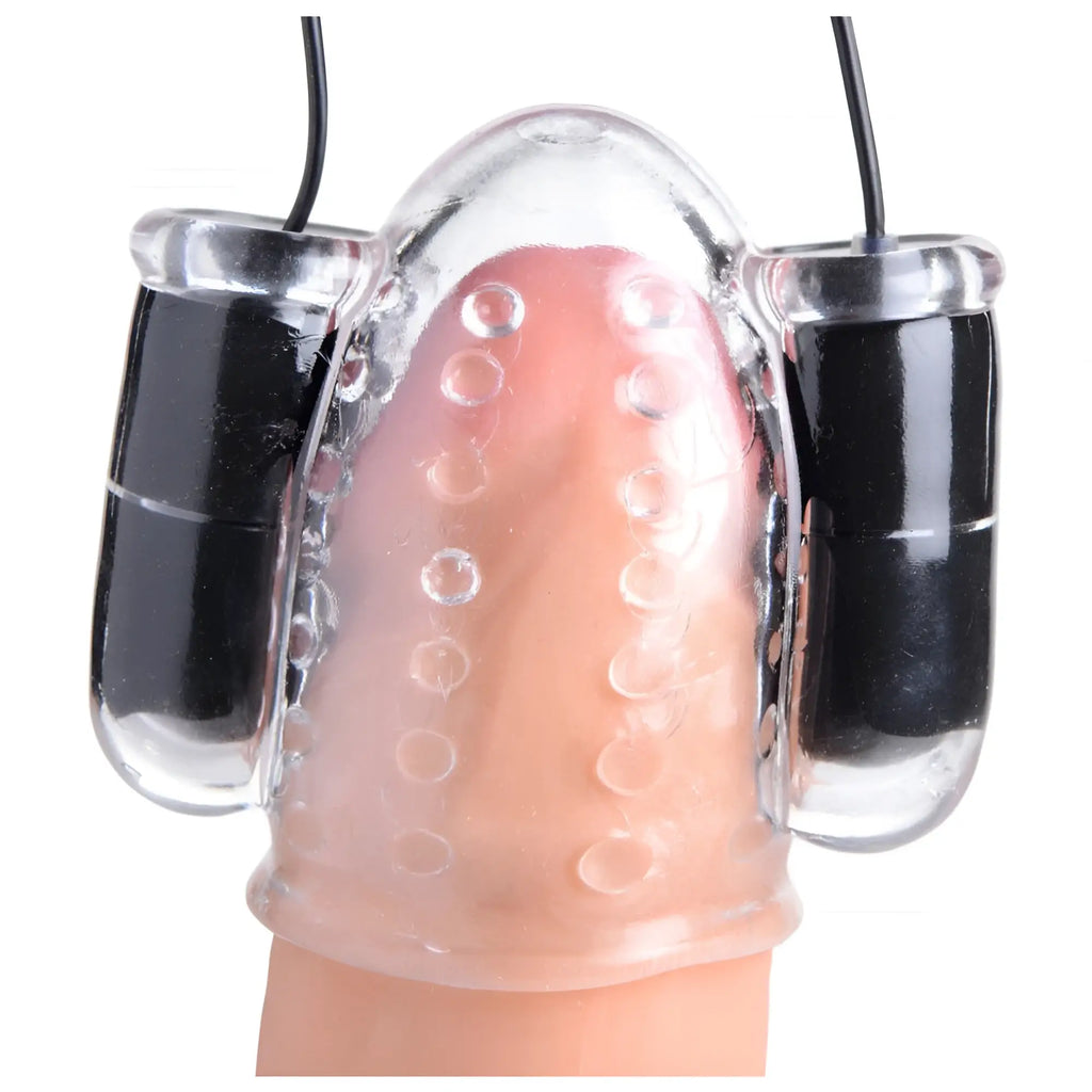 Trinity Men 20X Deluxe Dual Vibrating Head Teaser: A clear, textured silicone sleeve with two black vibration motors.