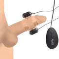 Trinity Men 20X dual vibrating cock teaser: clear textured ring with two black motors and a handheld black controller.