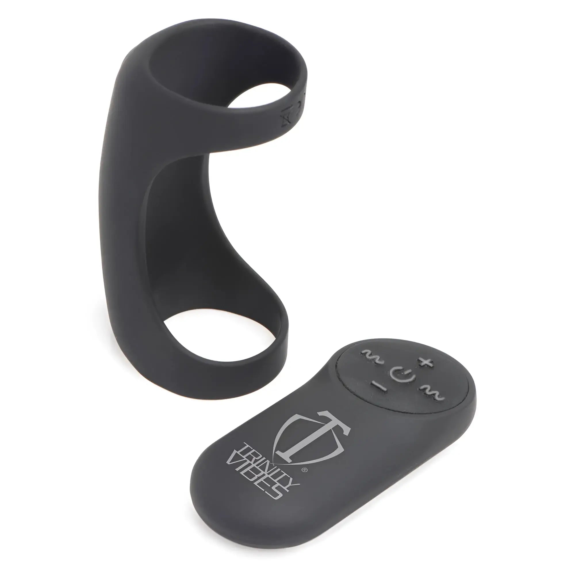 Black Trinity Men 28X G-Shaft silicone ring and matching remote control with power and vibration settings on white.