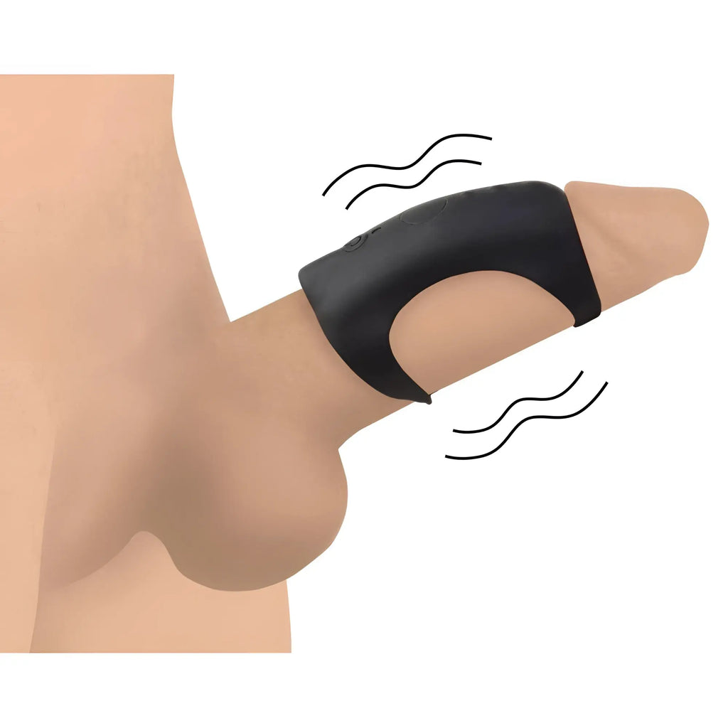 Trinity Men 28X black silicone G-shaft ring worn on a phallus, featuring remote control capabilities and vibration.