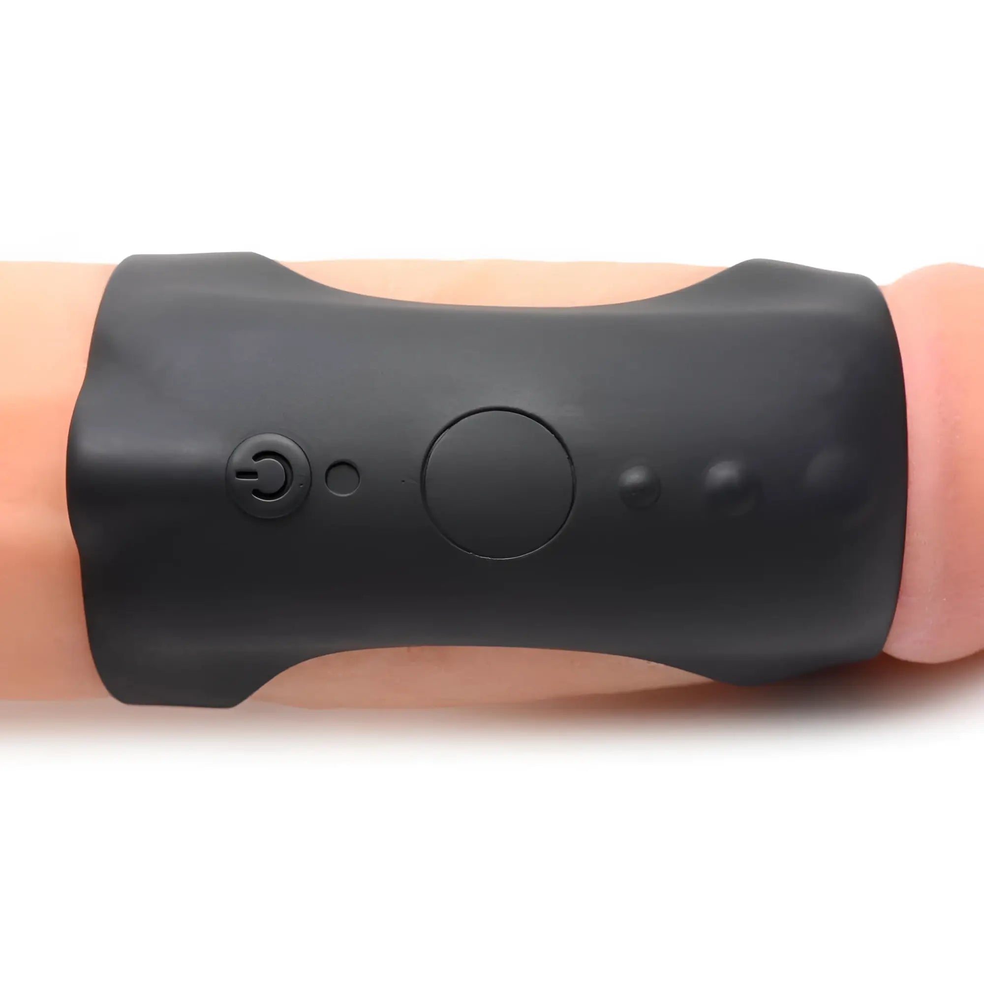 Trinity Men 28X G-Shaft silicone ring in black, featuring a sleek, wide band design with integrated control buttons.