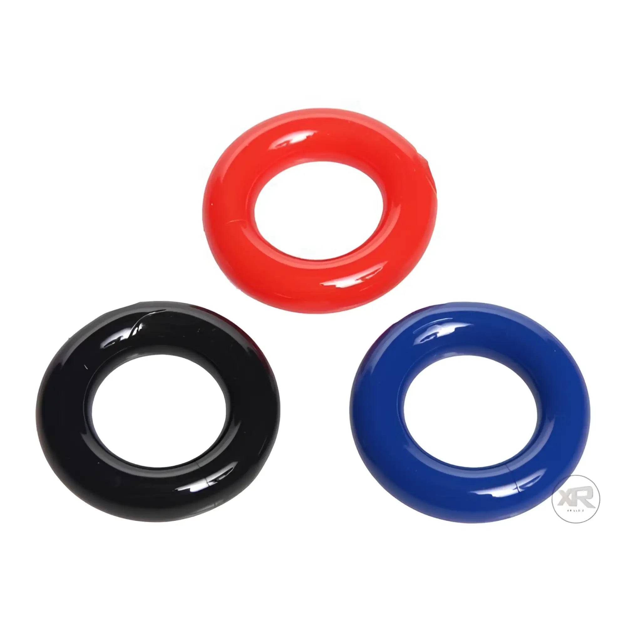 Trinity Men 3pk Stretchy Cock Ring Set: three smooth, round silicone rings in red, black, and blue.