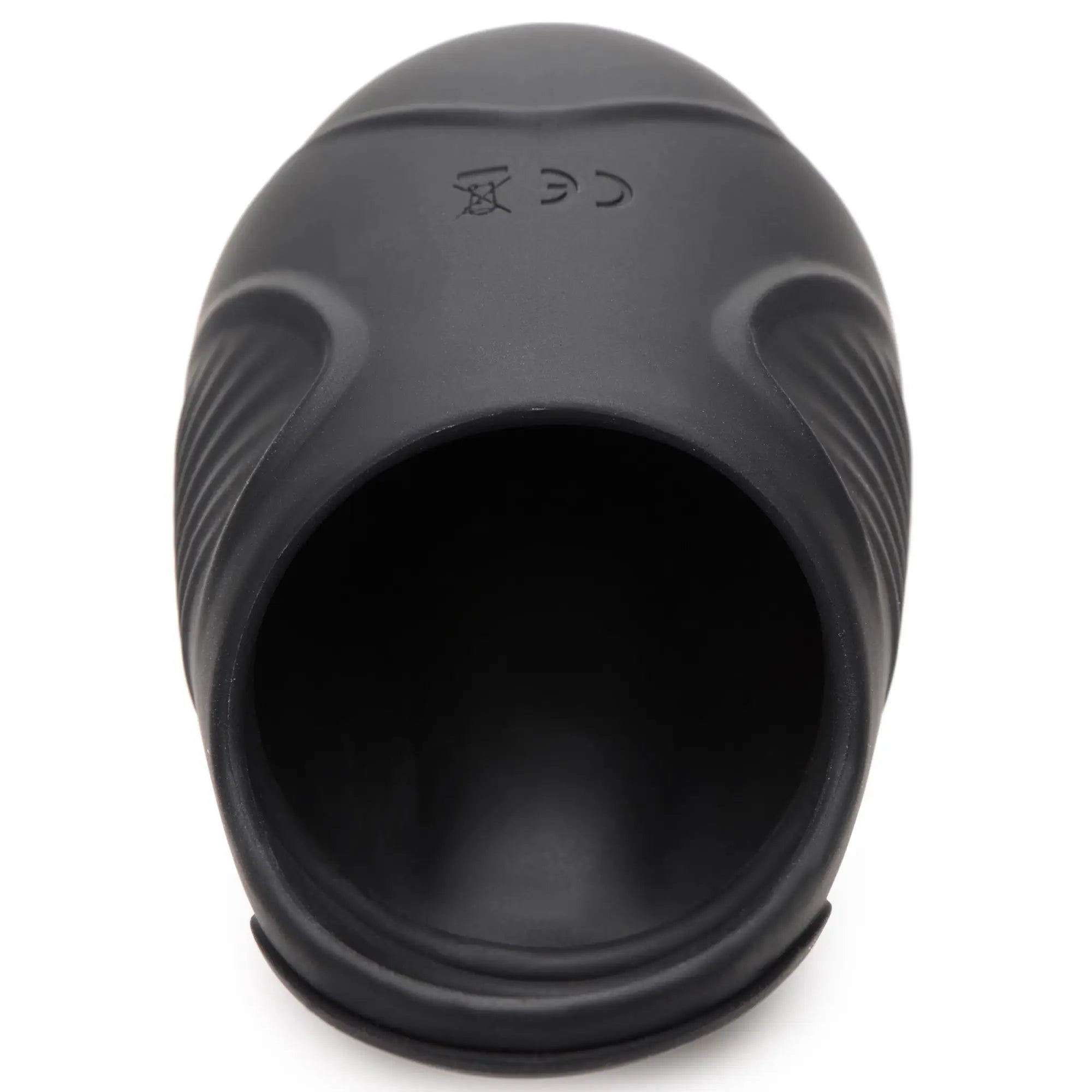 Trinity Men 7x vibrating silicone testicle massager: a smooth, black, oval-shaped ergonomic sleeve on a white background.