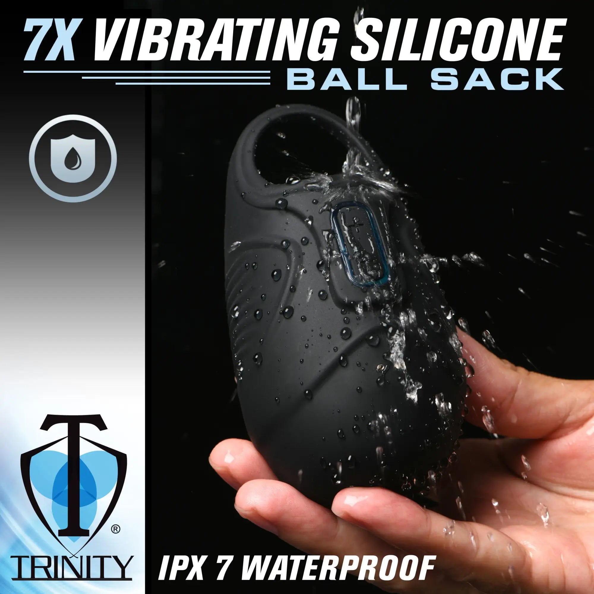 Trinity Men 7x vibrating black silicone massager being held and splashed with water against a black background.