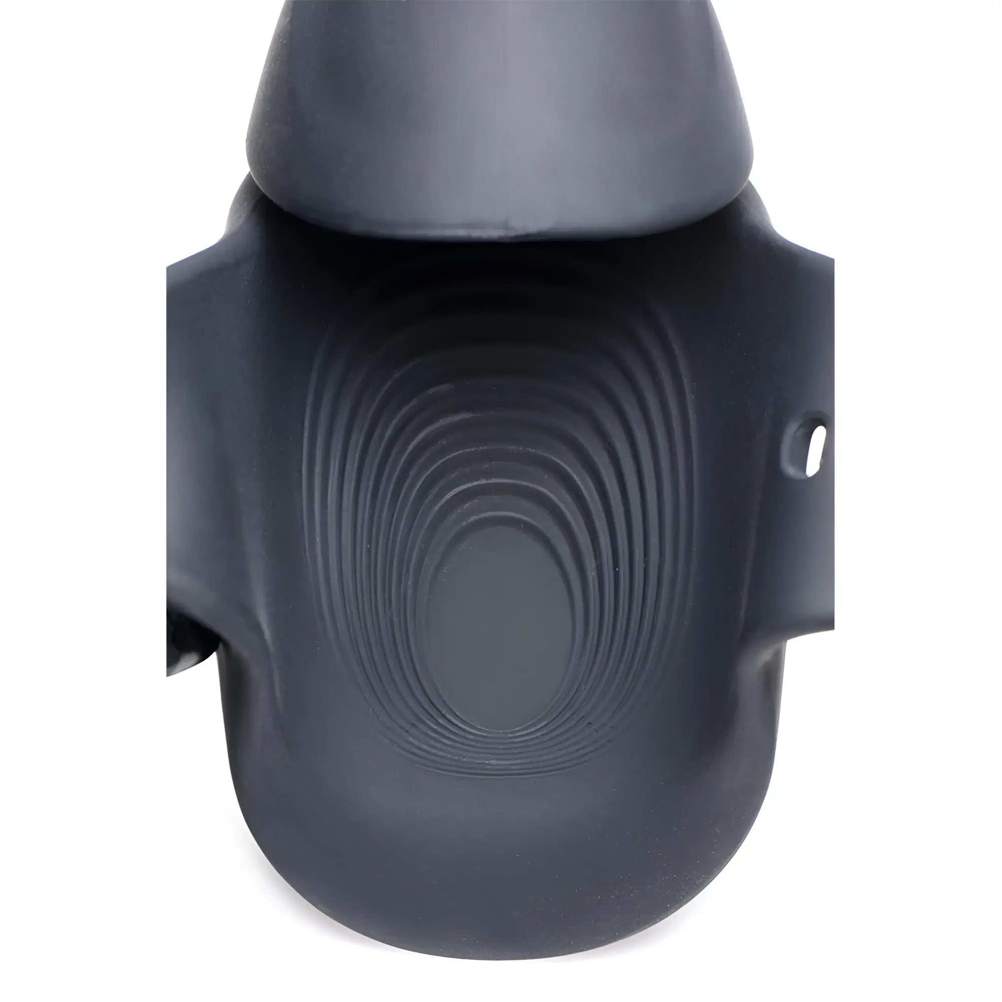 Trinity Men 8X Vibrating Silicone Stimulator in matte black, featuring a textured, ribbed oval interior design.