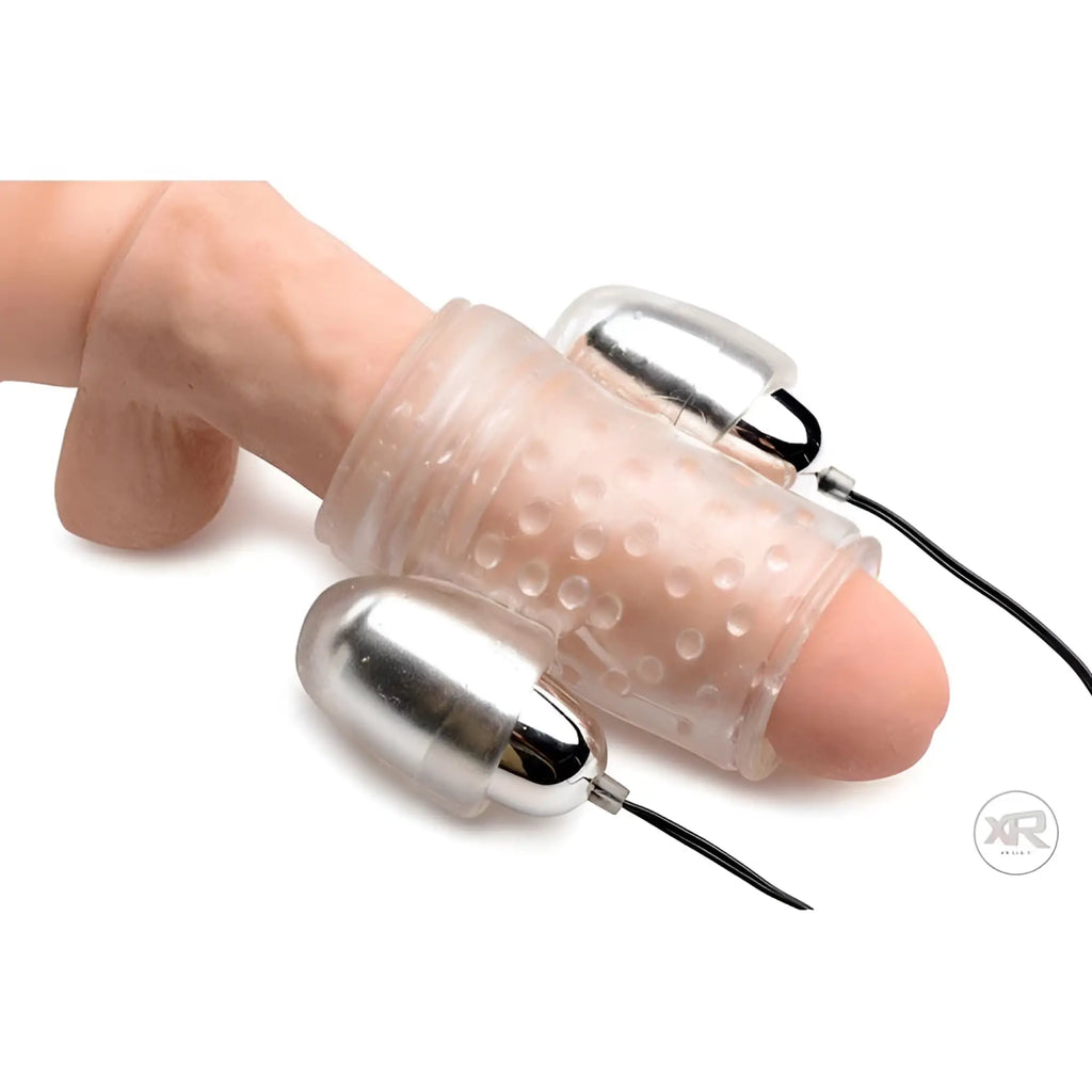 Trinity Men Dual Vibrating Penis Sheath: A clear, textured silicone sleeve featuring two chrome bullet vibrators.
