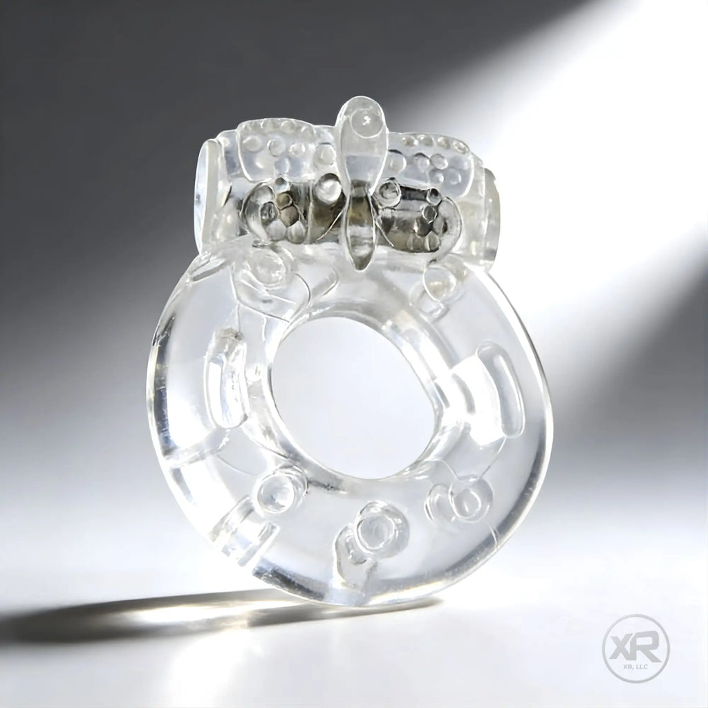 Trinity Men Platinum Orgasmic vibrating cock ring: a clear, textured, ring-style silicone enhancer with a top stimulator.