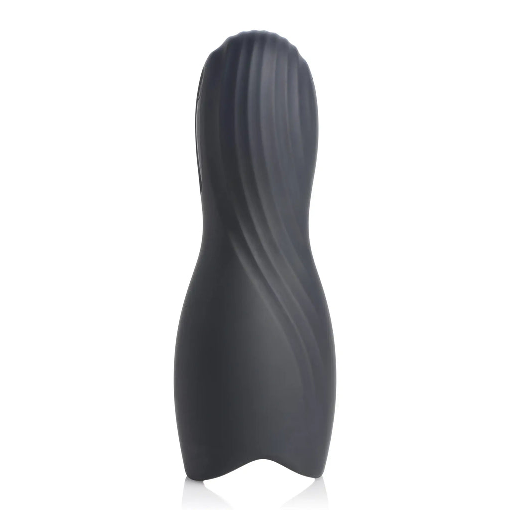 Trinity Men Vibrating Rechargeable Penis Pleaser: A matte black, sleek, hourglass-shaped device with spiral texturing.