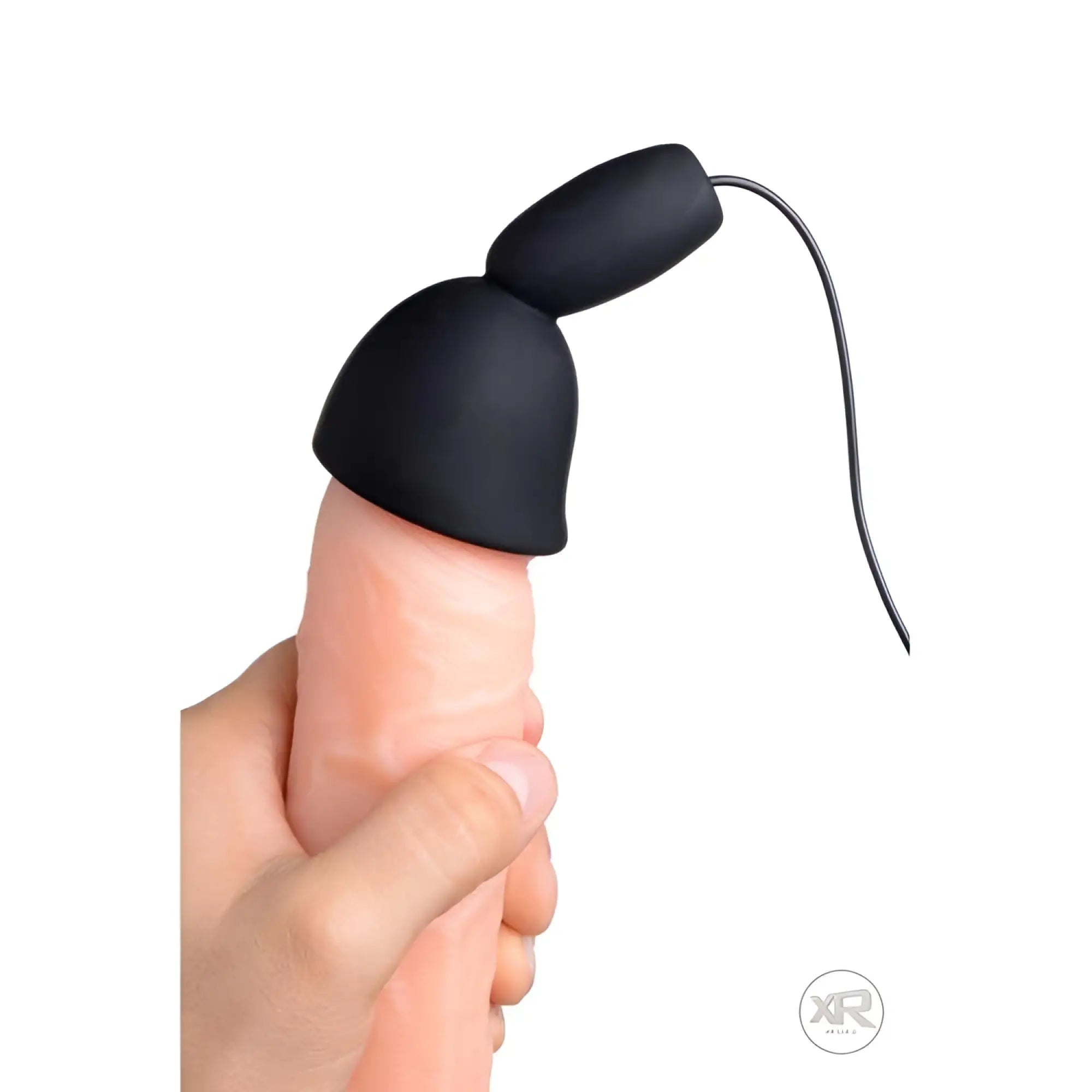 Trinity Vibes 10-Speed silicone teaser: a black, bell-shaped cap on a beige, phallic-shaped model held by a hand.