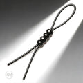 Trinity Vibes 4-Way Adjustable black silicone tie with a looped cord and four adjustable, smooth spherical beads.