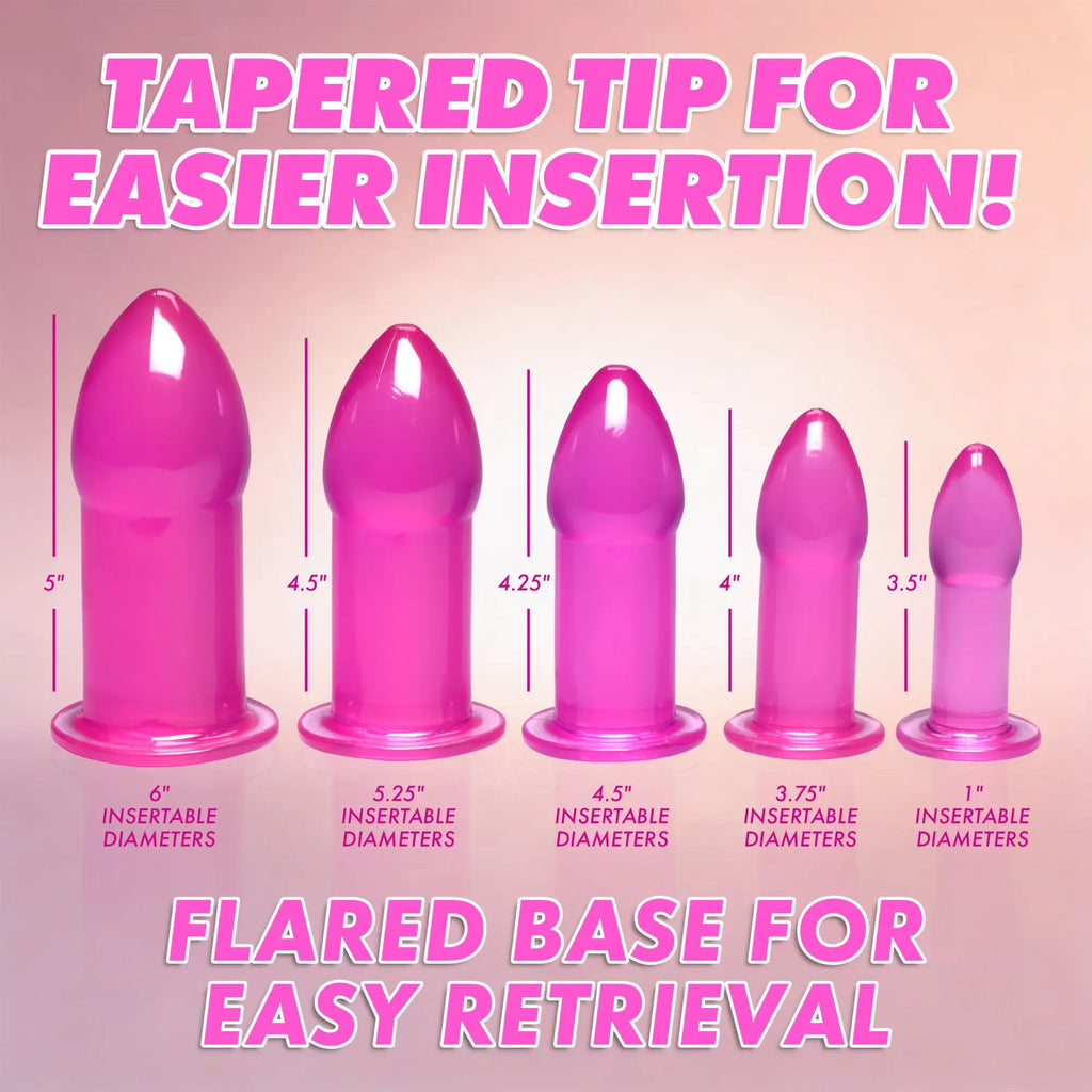 Trinity Vibes Purple 5pc Anal Trainer Kit: Five graduated, shiny purple silicone plugs with tapered tips and flared bases.