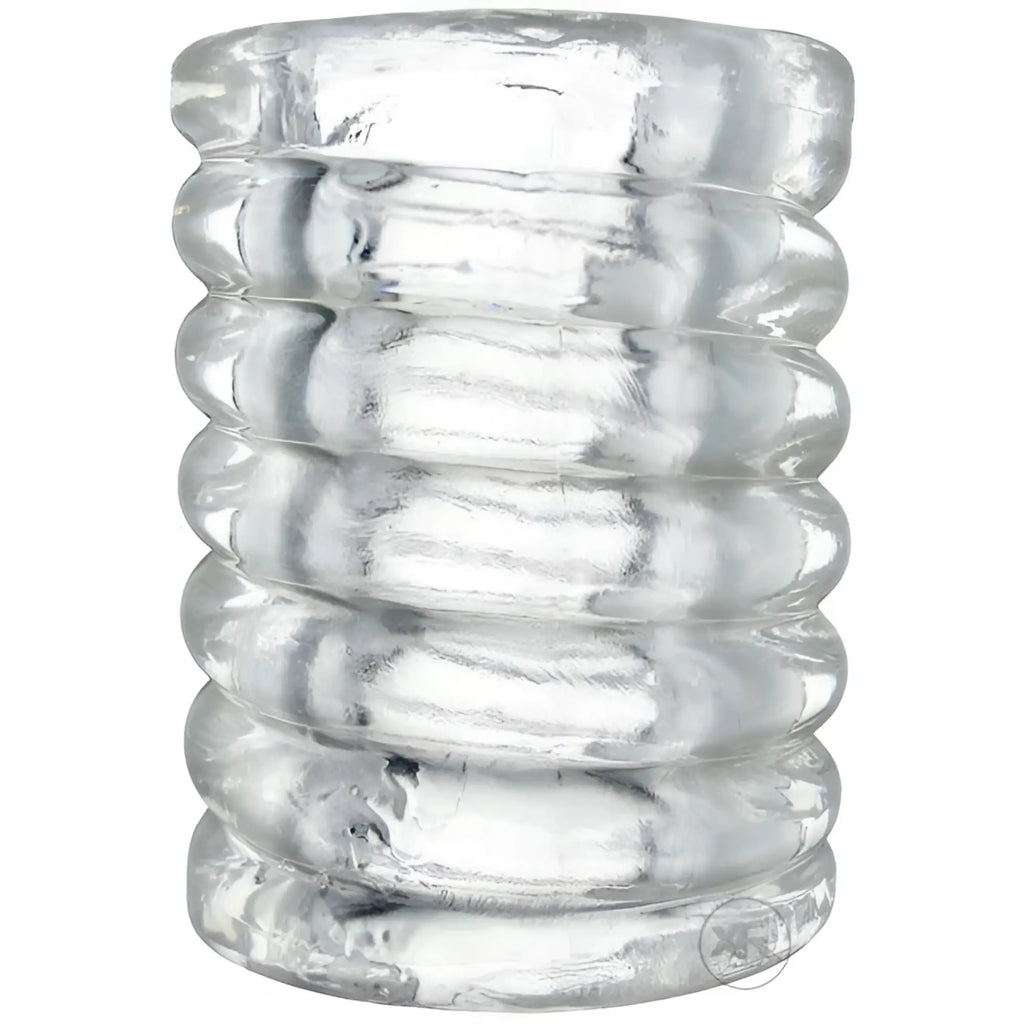 Trinity Vibes Spiral Ball Stretcher: A clear, cylindrical silicone sleeve with a ridged, spiraling design.