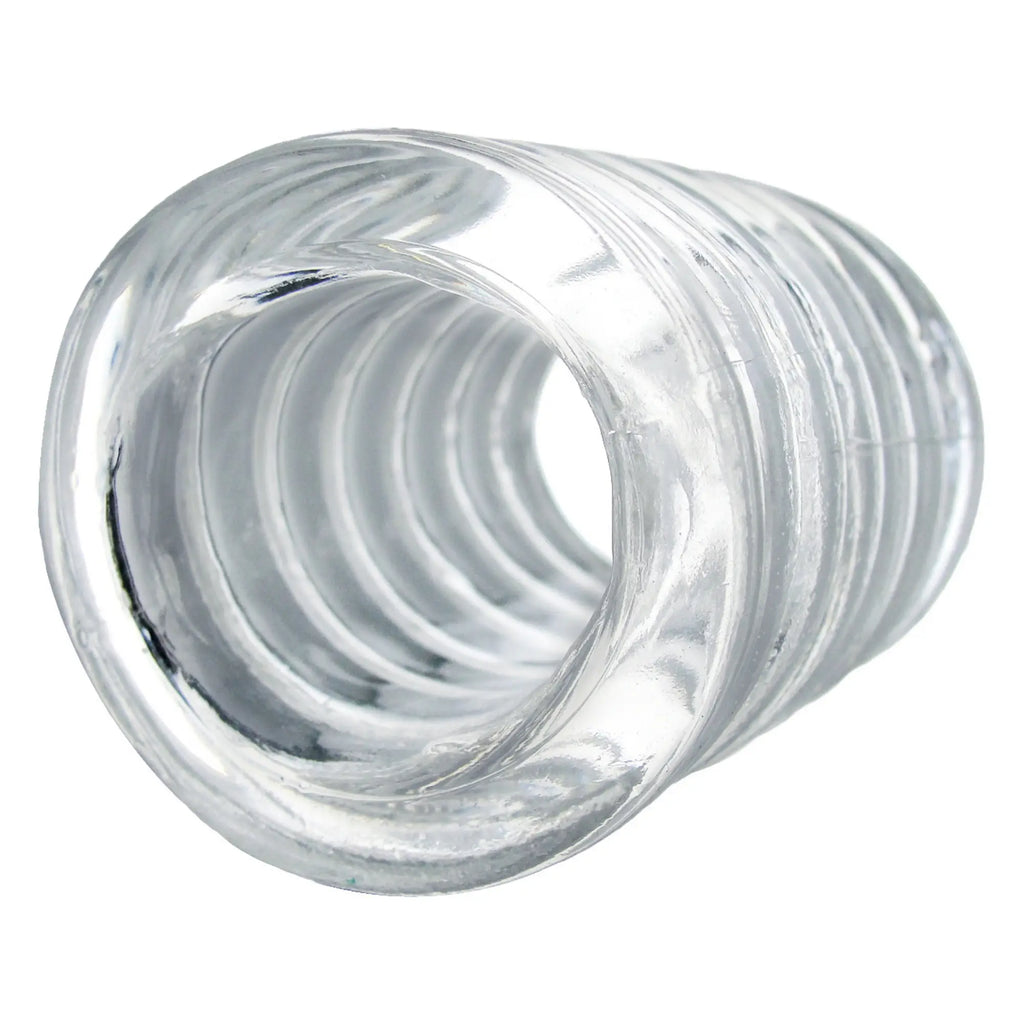 Trinity Vibes Spiral Ball Stretcher: A clear, flexible silicone tube with a ribbed, spiral-textured design.