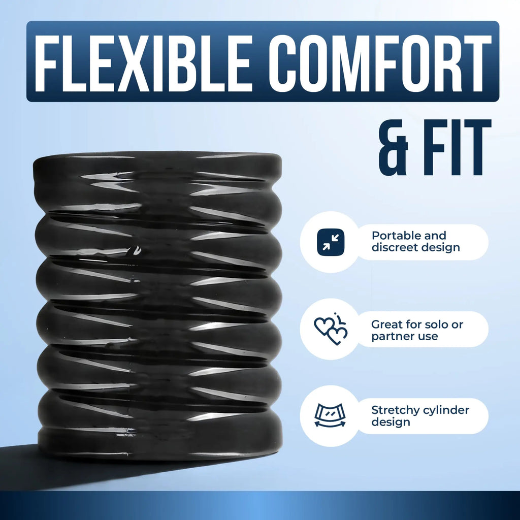 Trinity Vibes Stretch-To-Fit Cock Cage: A black, flexible, ribbed cylinder design against a blue background.