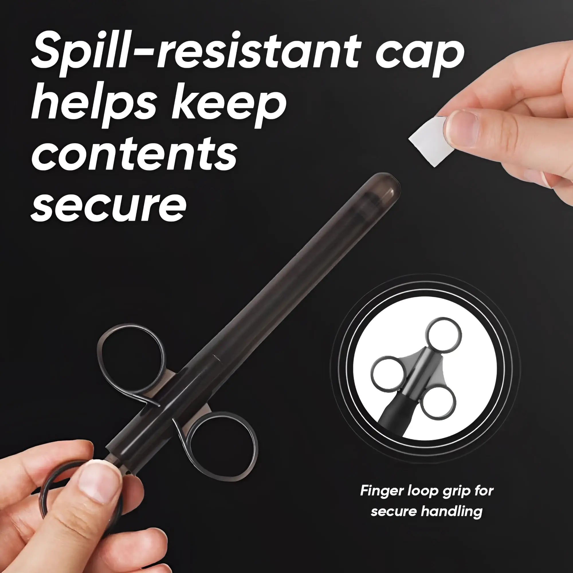 Trinity Vibes XL Lubricant Launcher: A sleek, black, syringe-style tool with finger loops for a secure, easy grip.