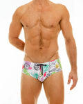 White tropical fruit swim brief with vibrant fruit and leaf pattern and black drawstring for beachwear