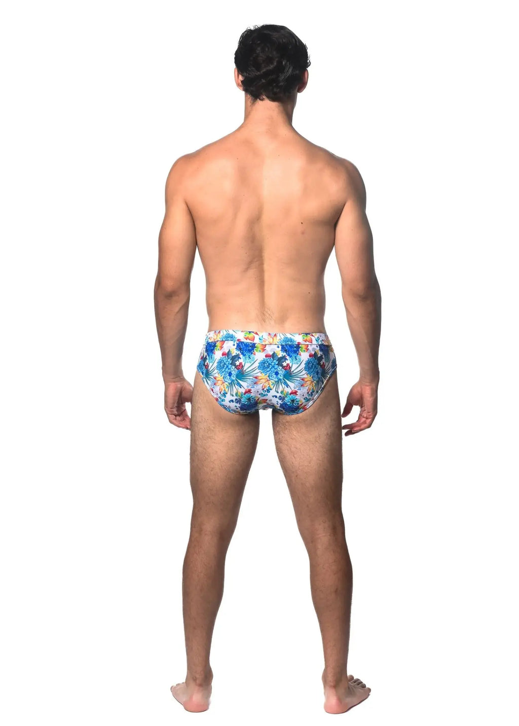 Tropics printed swim brief featuring blue and yellow floral patterned lightweight swim trunks for men