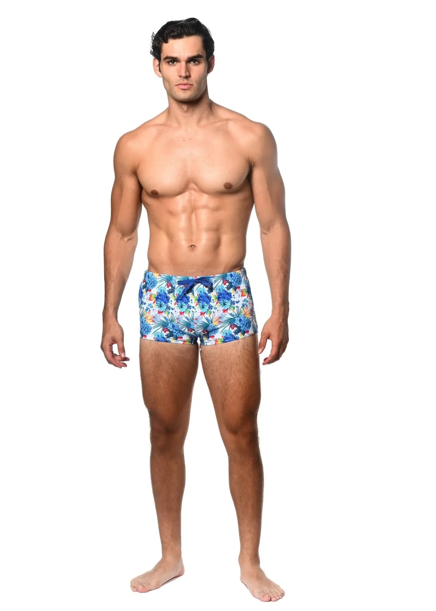 Blue and white tropics printed swim trunk with tropical print and a matching blue drawstring for beachwear