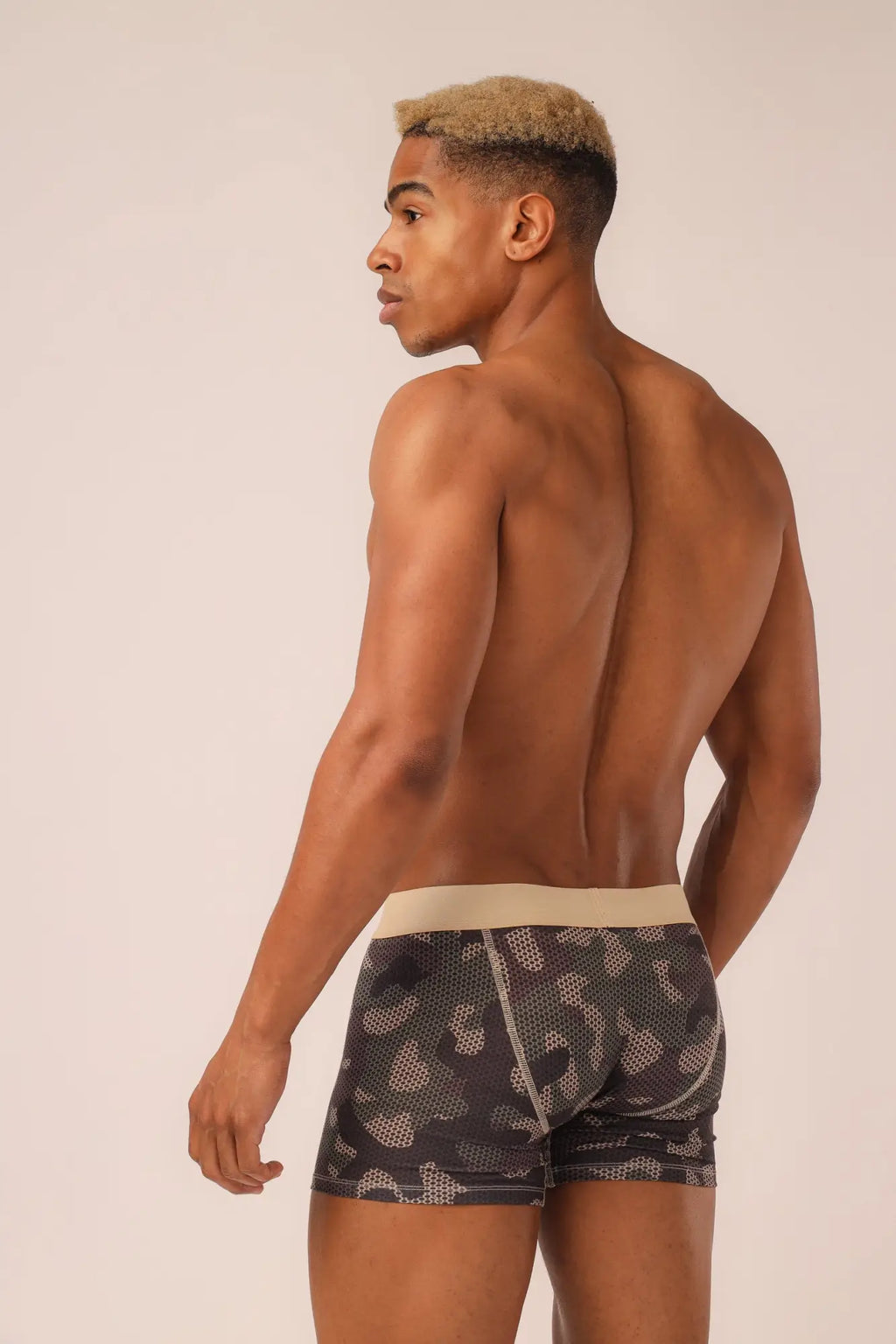 Black and gray camouflage patterned trunks with beige elastic waistband comfortable boxer briefs