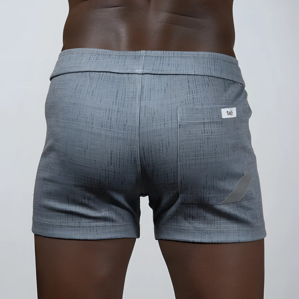 Back view of gray tulio linen texture shorts with subtle woven pattern and white brand tag on back pocket