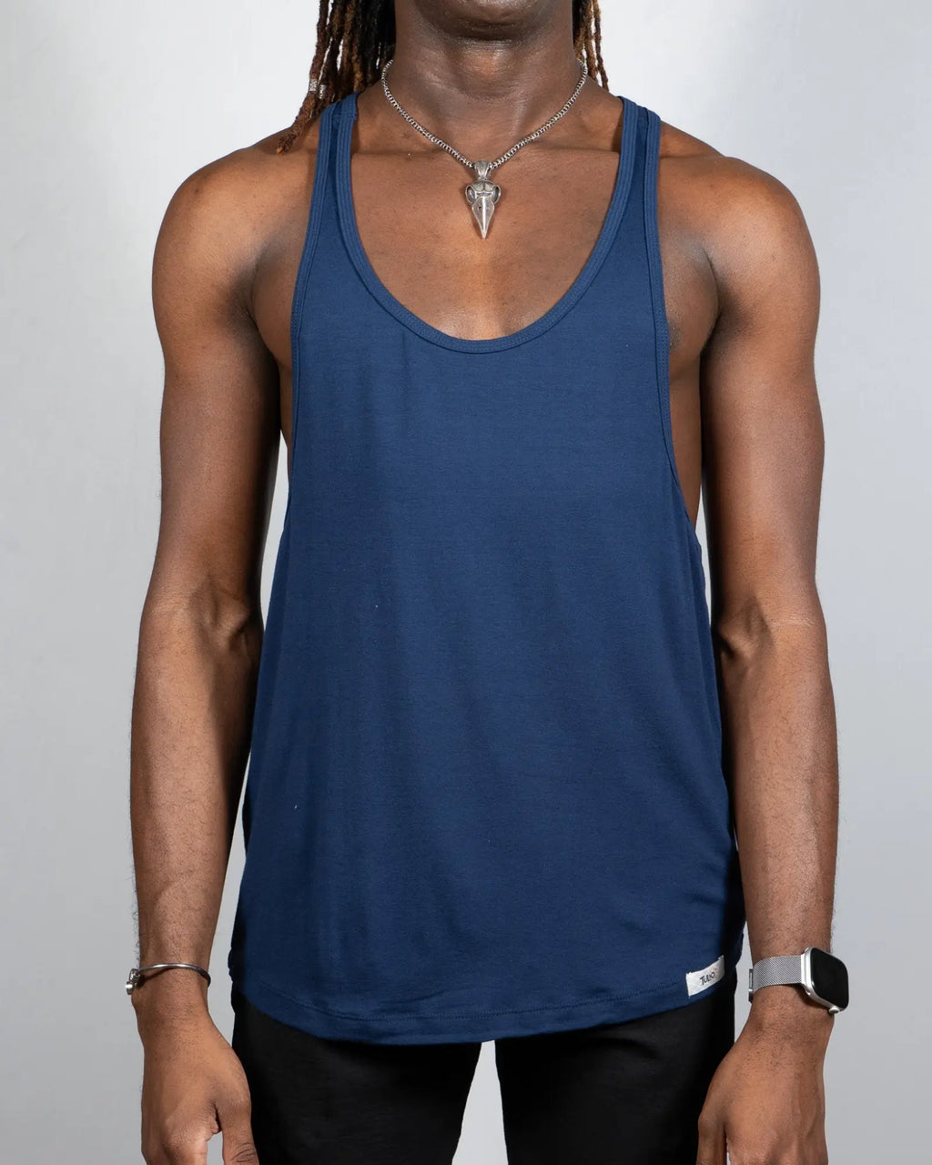 Navy blue sleeveless Tulio racerback tank top made of breathable fabric ideal for casual wear in four colors available