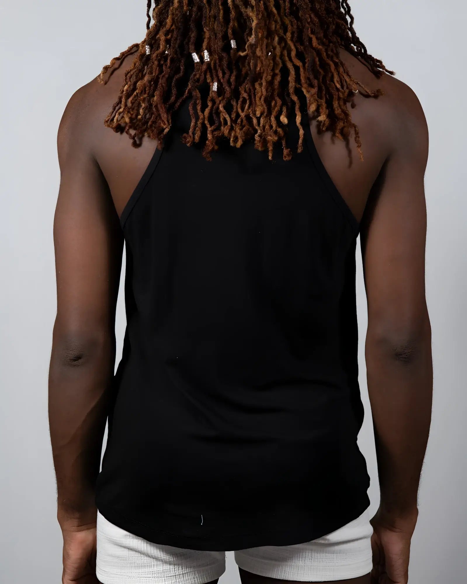 Black sleeveless tulio solid tank top with relaxed fit and rounded hem perfect for casual wear