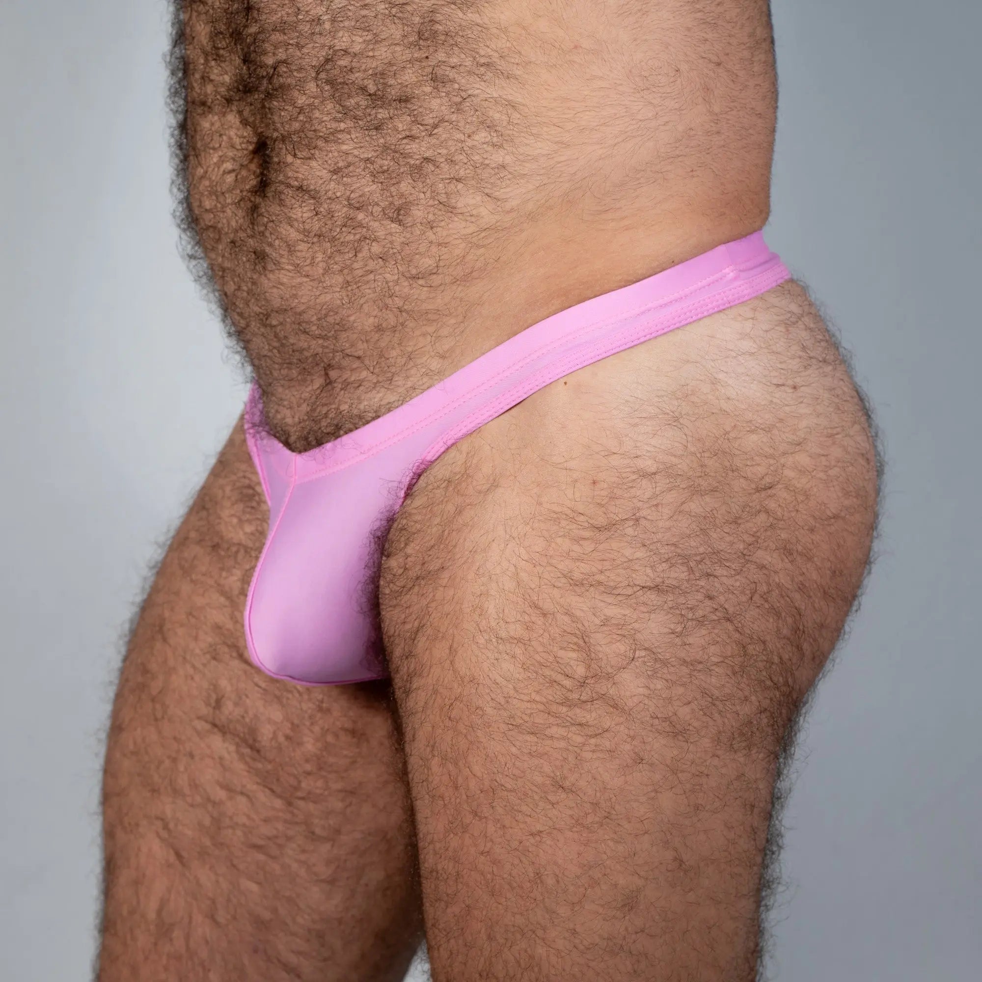 Pink tulio swim thong made of mesh fabric designed for comfortable swimwear use