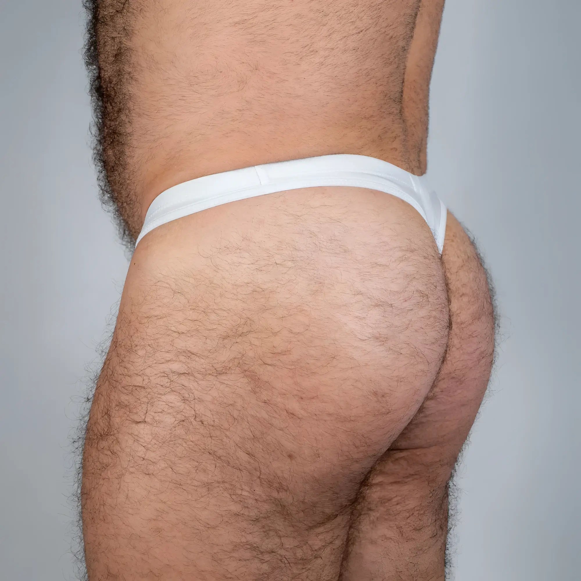 White cotton Tulio swim thong with a simple seamless design ideal for comfortable swimwear use
